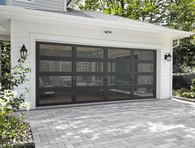 Mayfield Heights Garage Door Repair design specialist presenting custom garage door options to Mayfield Heights homeowner