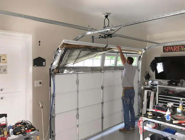 Garage door section replacement by Mayfield Heights Garage Door Repair in Mayfield Heights