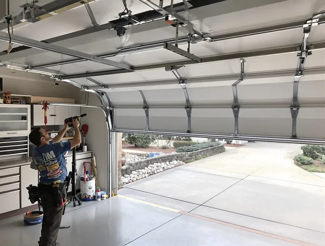 Garage door track repair service by Mayfield Heights Garage Door Repair in Mayfield Heights